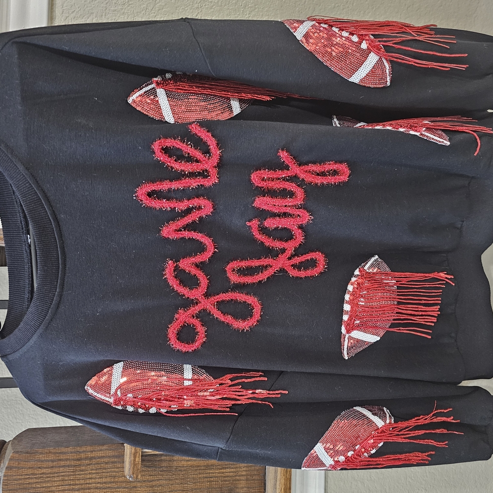 Black Sweatshirt with Red Embellishments